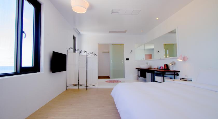 Sea Shore Hotel Manzhou Quarto foto