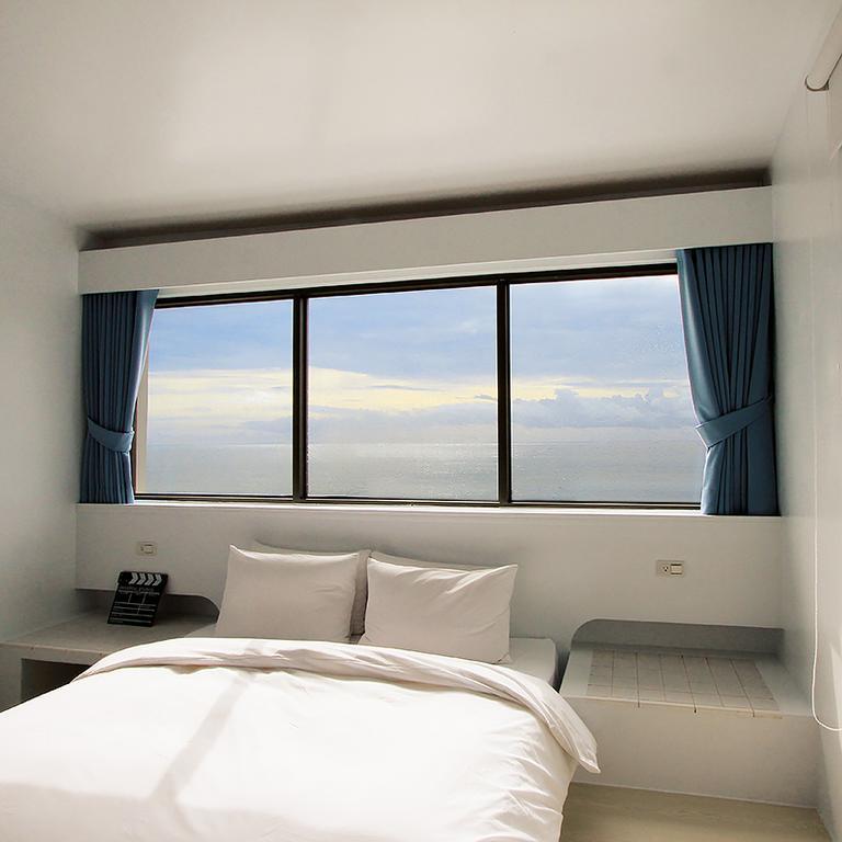 Sea Shore Hotel Manzhou Quarto foto