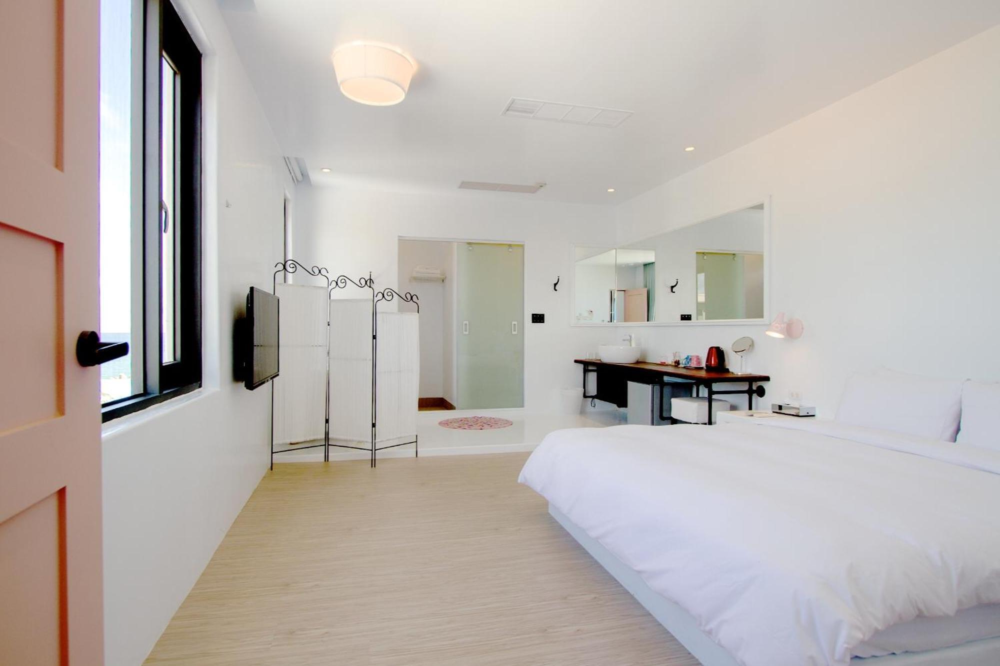 Sea Shore Hotel Manzhou Quarto foto