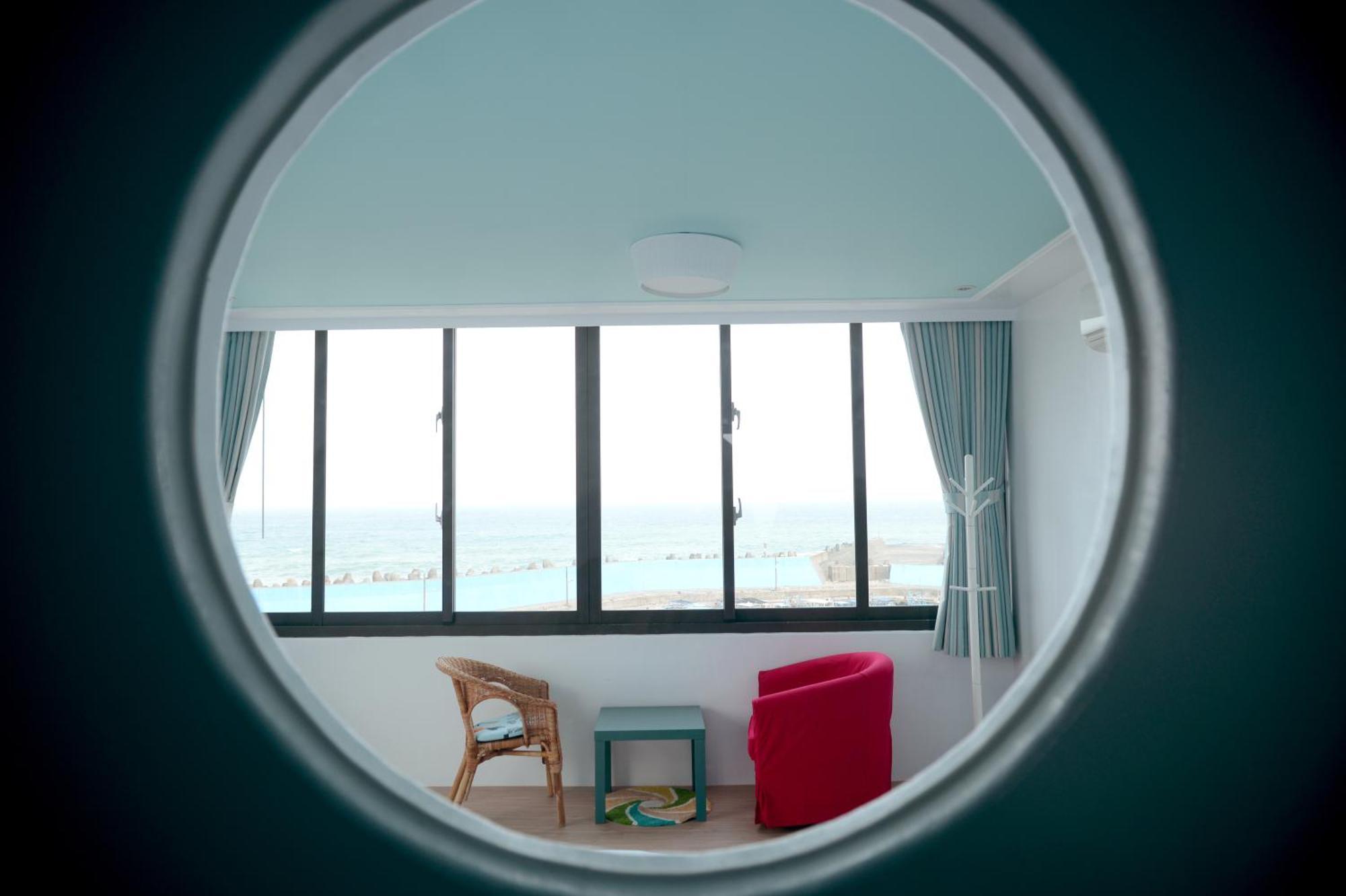 Sea Shore Hotel Manzhou Quarto foto