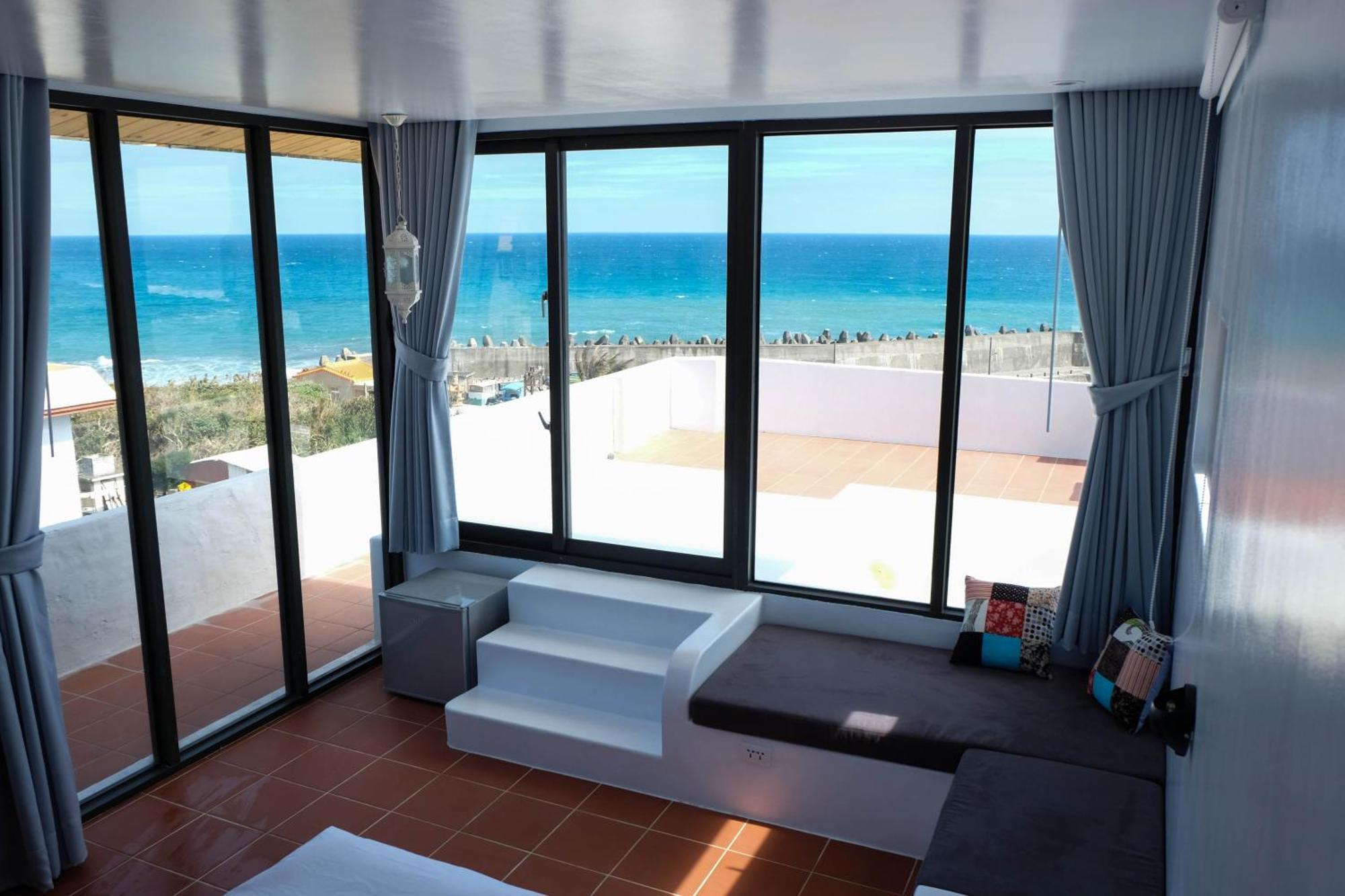Sea Shore Hotel Manzhou Quarto foto